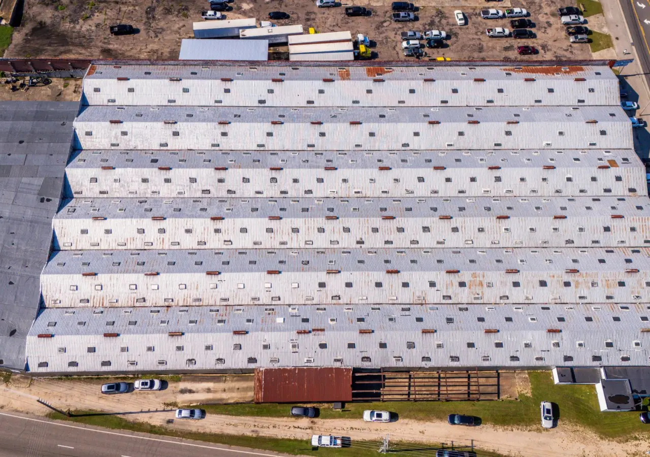Aerial view of a large commercial warehouse roof